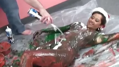Horny Whore In Christmas Skirt Gets Covered In Paint And Whipped Cream