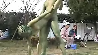 Green Japanese garden statues fuck in public