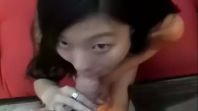 Hot Chinese babe giving a hot blowjob
