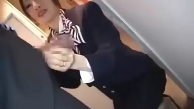 Asian Stewardess gives Hot Handjob on Airplane