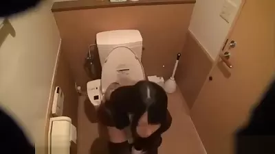 Ai Uehara peeing on toilet
