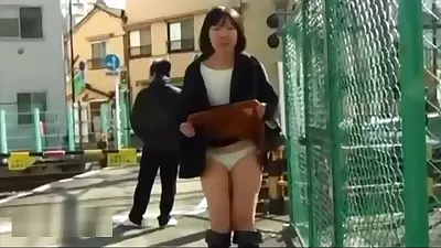 Japanese girl pussy flashing in public streets