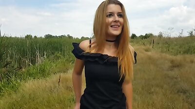 His sexy girlfriend does a blowjob in a field